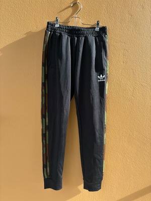 Adidas Originals women's black sweatpants with camouflage stripes like new