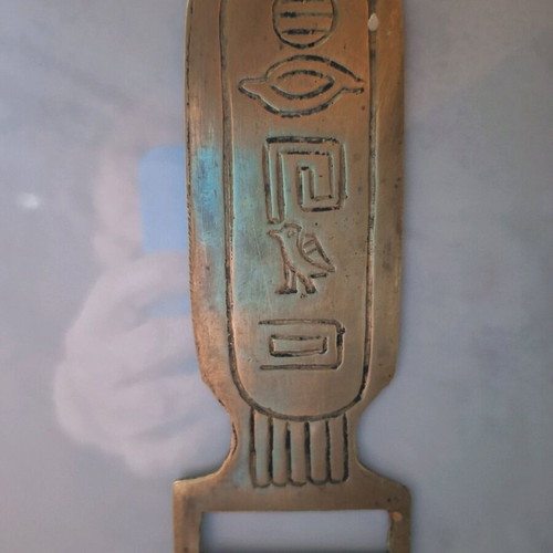Brass bottle opener with Egyptian hieroglyphs used, 15 cm