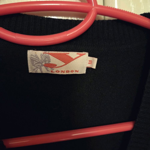 Black short cardigan with three-quarter sleeve used, size M