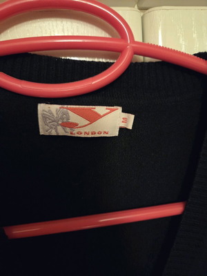 Black short cardigan with three-quarter sleeve used, size M
