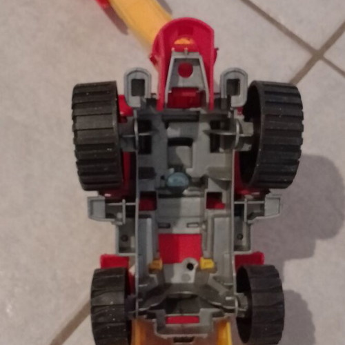 Beach toy set: plastic wheelbarrow, shovel, rake, small excavator