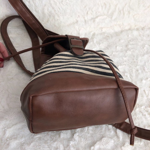 Striped backpack bag used