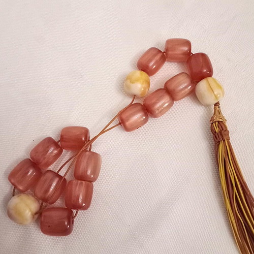 Worry beads with synthetic resin beads in orange color like new