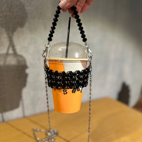 Cup holder handmade with black and silver beads