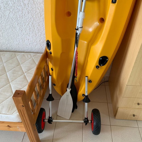 Sea Canoe used with seat, two paddles and transport wheels