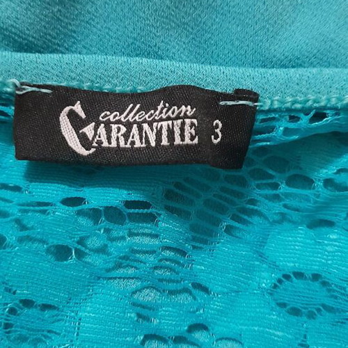 Garanties one-piece jumpsuit new, turquoise with lace back