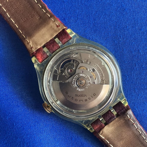 Swatch automatic wristwatch, red fabric and leather strap