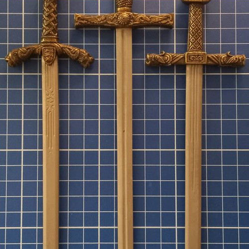 Decorative historical swords used with wooden base and metal mounts
