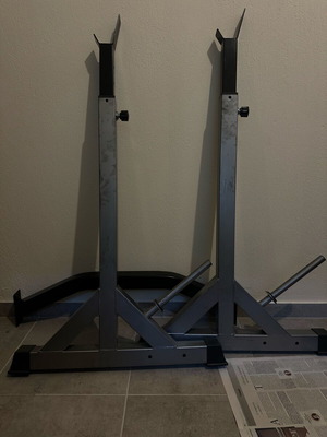 X Fit Squat Rack like new with safety and weight holders