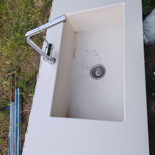 Corian sink with telescopic faucet like new