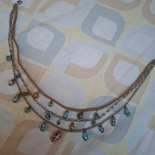 Necklace like new, decorated with small colorful beads