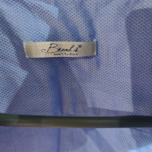 Men's shirt new light blue with perforated details size L