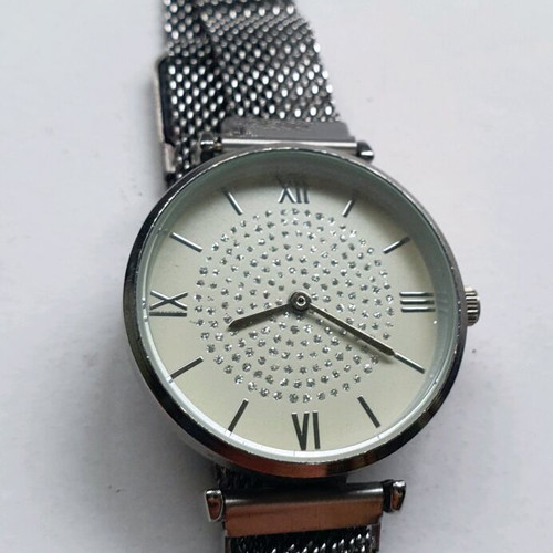 Metal watch silver with Latin dial 30mm and magnetic bracelet like new