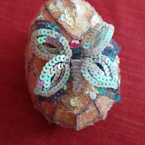 Handmade decorative egg like new with sequin embroidery and butterfly