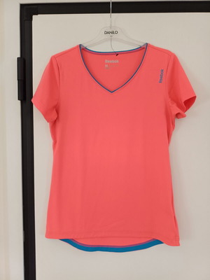 Γυναικείο αθλητικό μπλουζάκι Reebok, μέγεθος Medium, κοραλί με σιέλ λεπτομέρειες