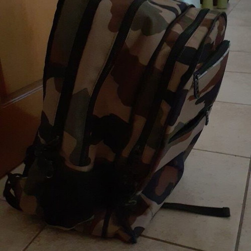 Polo school bag like new with orange rain hood