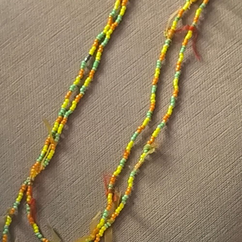 Long necklace like new with yellow, orange and green beads
