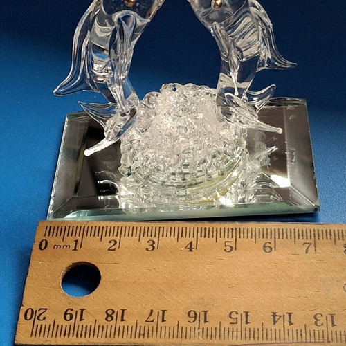 Glass figurines dolphin and duck used, mirror base