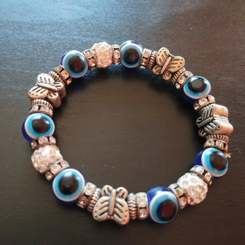 Bracelet with blue evil eye beads used