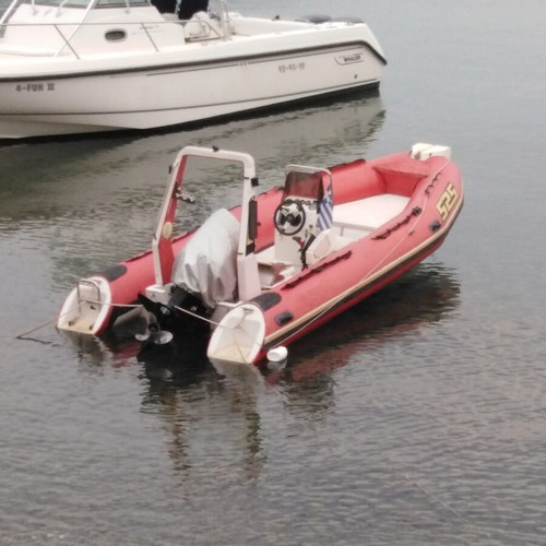 Olympic 5.25 inflatable boat with 115 Mercury engine