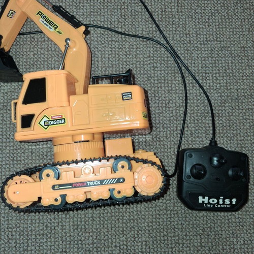 Set of remote control children's vehicles used, excavator and fire truck
