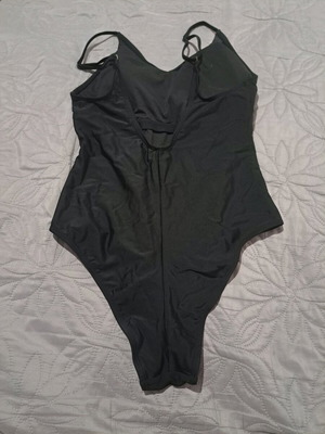 Black one-piece swimsuit like new, size S with V-neck and thin straps