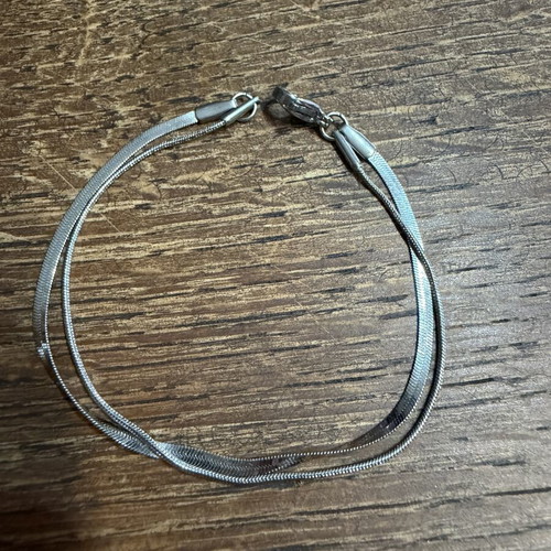 Double bracelet with steel chains new, silver color