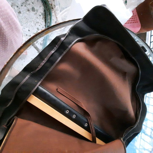 Travel sack used, brown, waterproof fabric with leather details