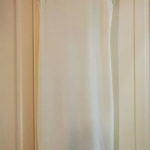 White elastic dress knee-length like new