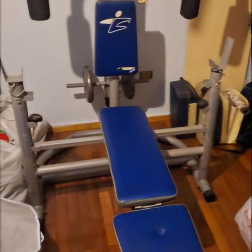 Fitness multi-gym like new with 2 discs 10kg and 2 discs 5kg