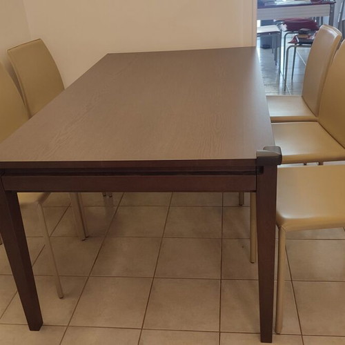 Roche Bobois dining set with 6 beige leather chairs like new