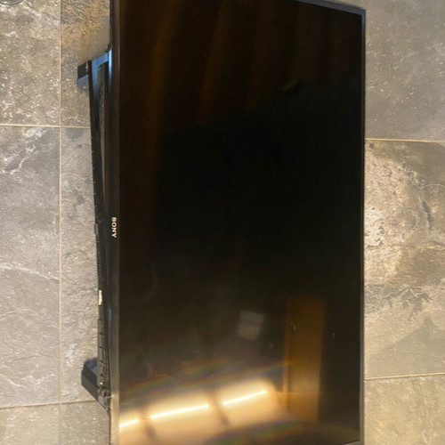 Sony 48” Smart TV like new with soundbar and subwoofer