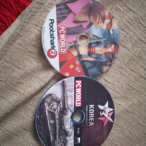 PC World games used, 2 DVDs Korea Forgotten Conflict and Pool Shark 2