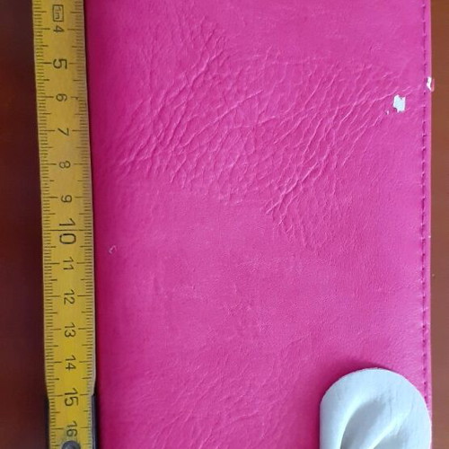 Pink wallet used with white bow
