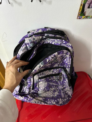 Backpack like new with purple and white pattern