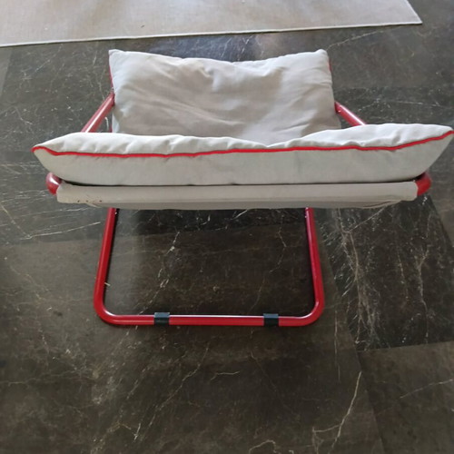 Outdoor and indoor armchair with cushions used