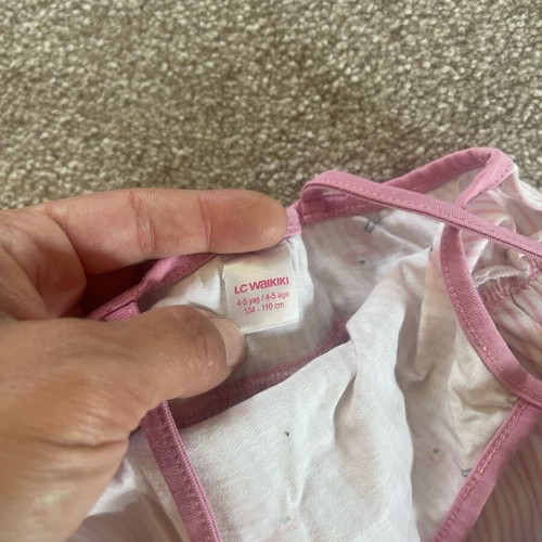 Girls' dress used 4-5 years old, pink with yellow stain