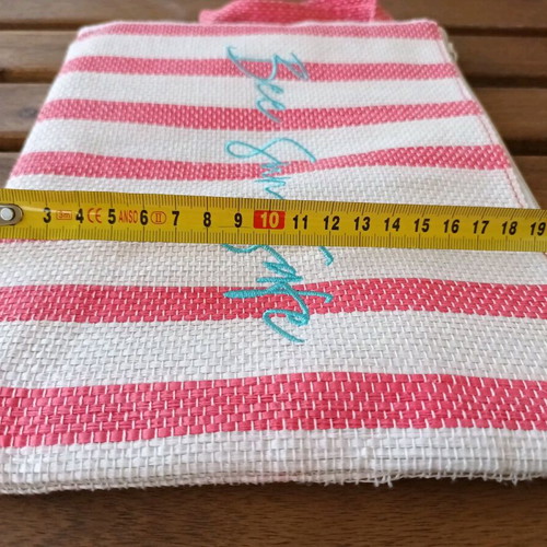 Summer toiletry bag used striped with embroidered Bee Sun Safe phrase