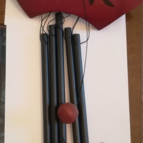 Melodos made of wood and metal with painted ideograms and Chinese zodiac new