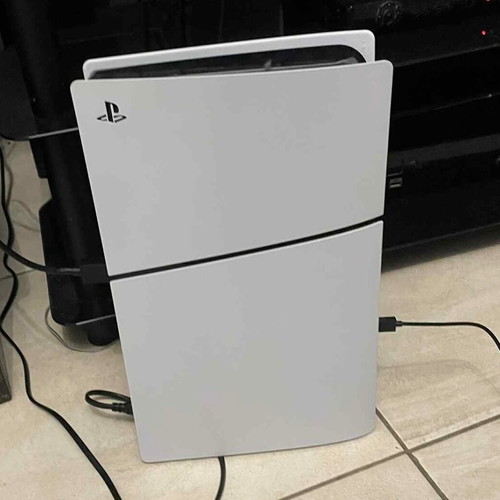 PlayStation 5 (PS5) console like new with 1TB storage and 2 wireless controllers