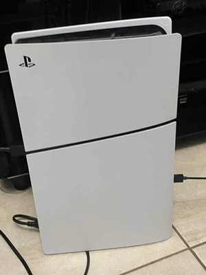 PlayStation 5 (PS5) console like new with 1TB storage and 2 wireless controllers