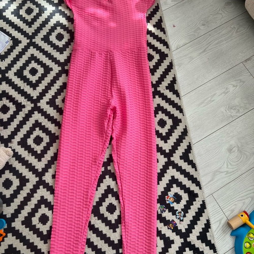 Women's sports jumpsuit with cut-out back like new, pink, size S/M