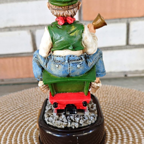 Decorative figure with motion sensor used, train engineer on locomotive