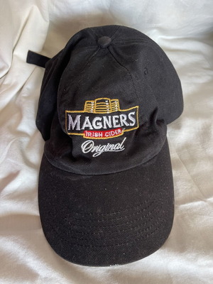 Magners cider branded hat used with small discoloration