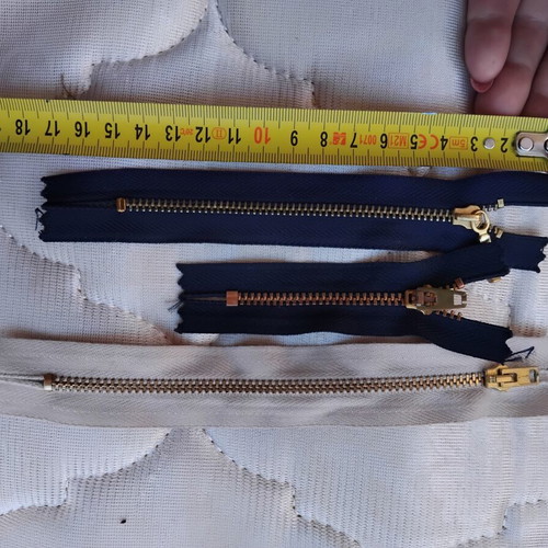 Metal and plastic sewing zippers YKK, assorted colors and sizes, pack
