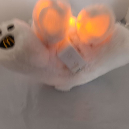 White glowing McDonald's bear used