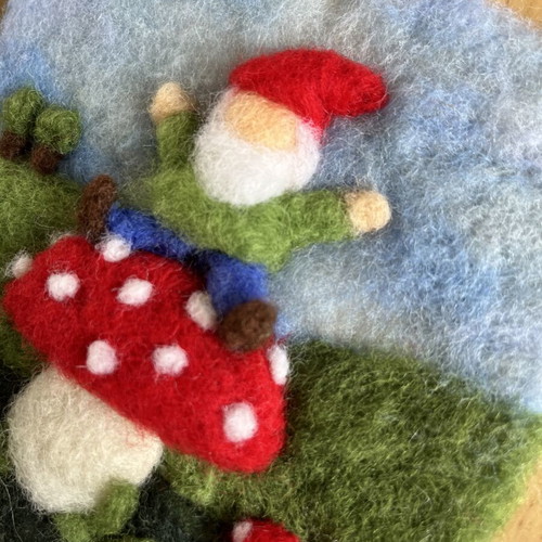 Handmade wool wall art with gnome on mushroom
