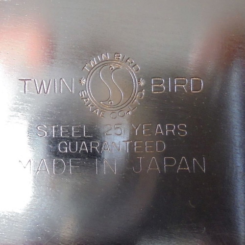 Twin Bird metal serving tray with engraved decoration