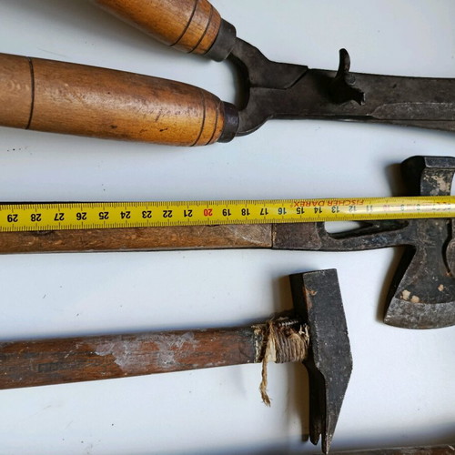 Set of old handmade tools used with wooden handles