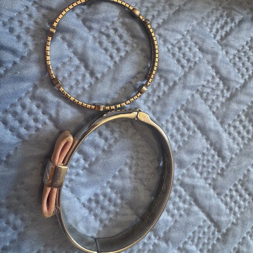 Bracelets pack of two, one collectible pink ribbon, used